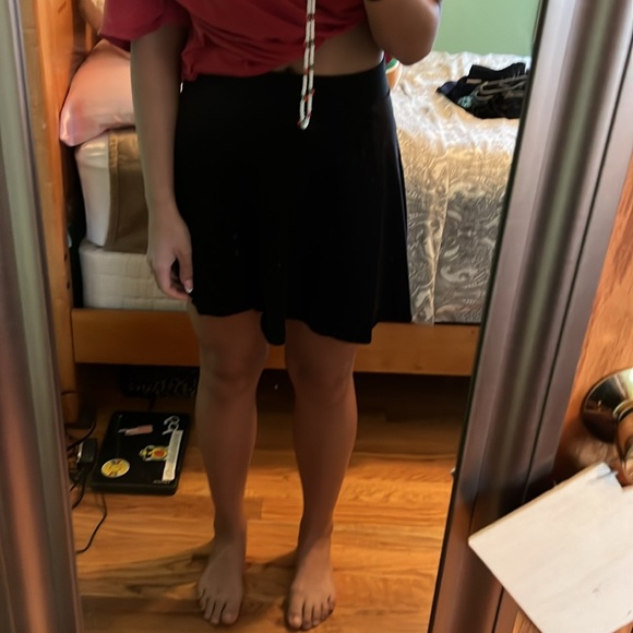 I am selling a simple black skirt that is in fair condition. - Picture 3 of 3